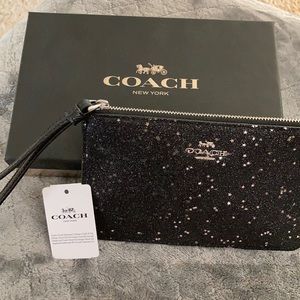 Coach sparkle and stars wristlet